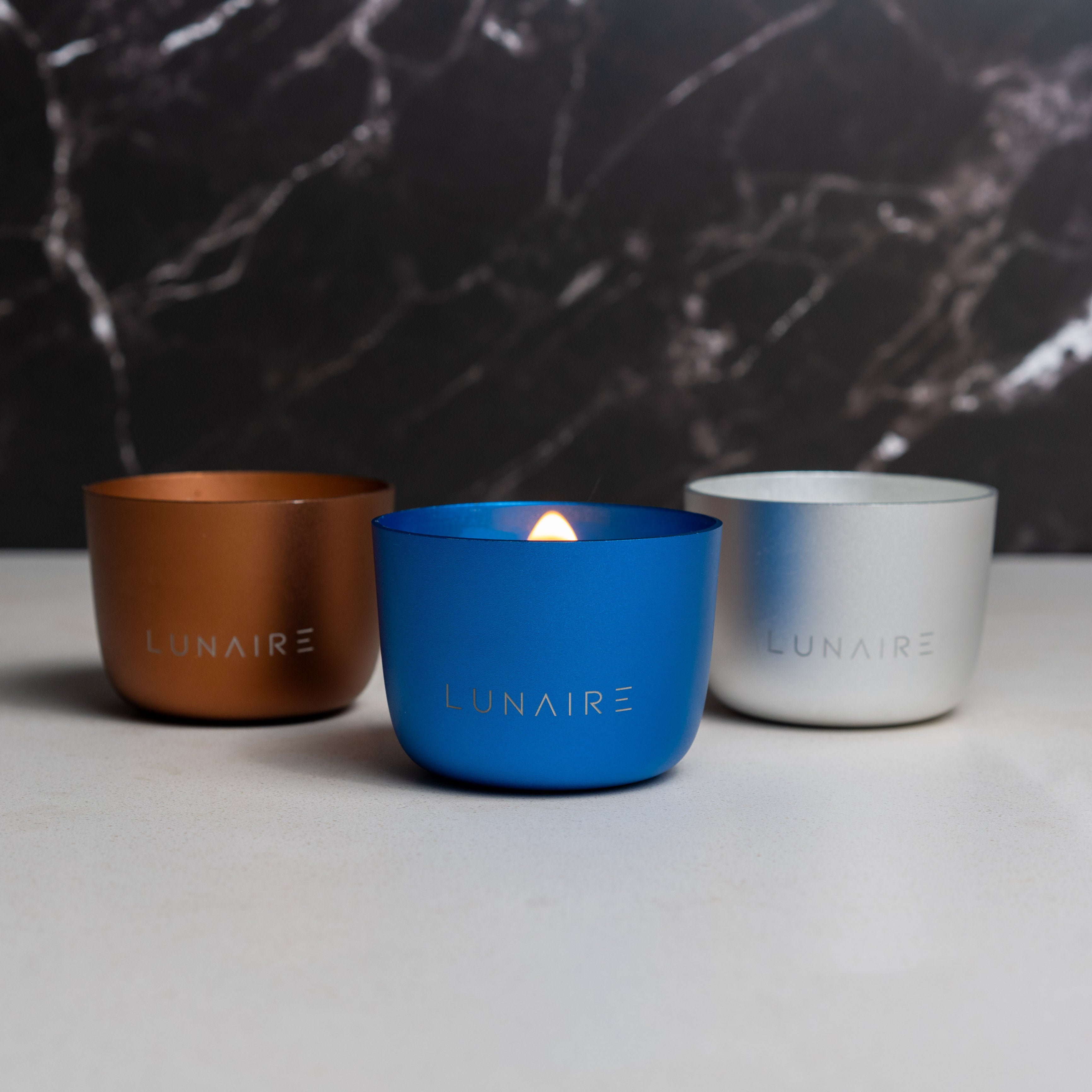 forever candles in bronze blue and silver