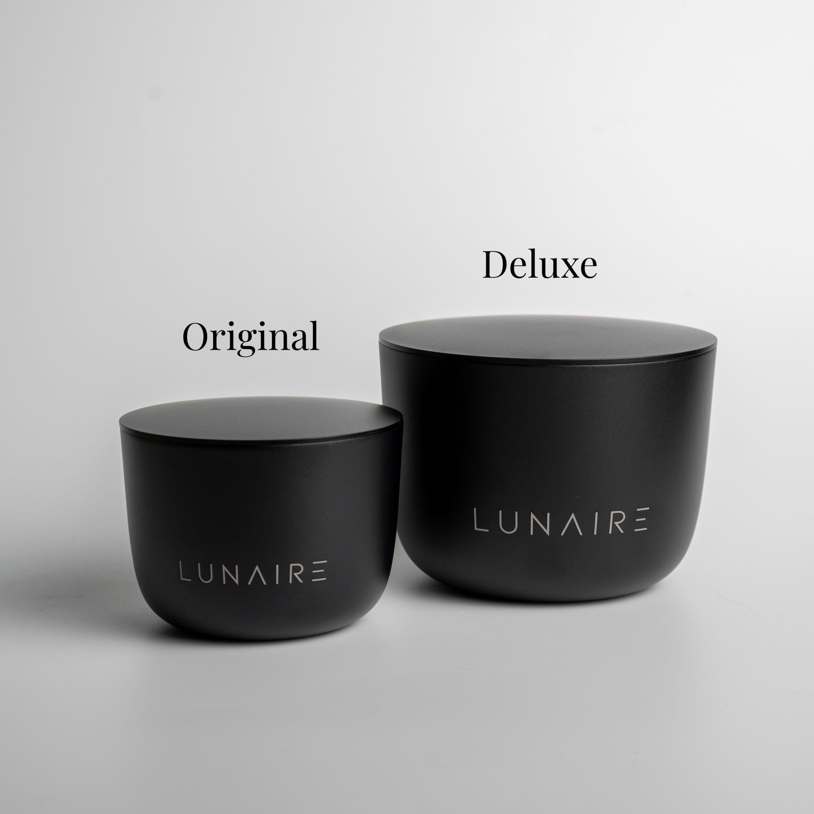 Two black containers labeled 'Original' and 'Deluxe' by LUNAIRE on a gray background.