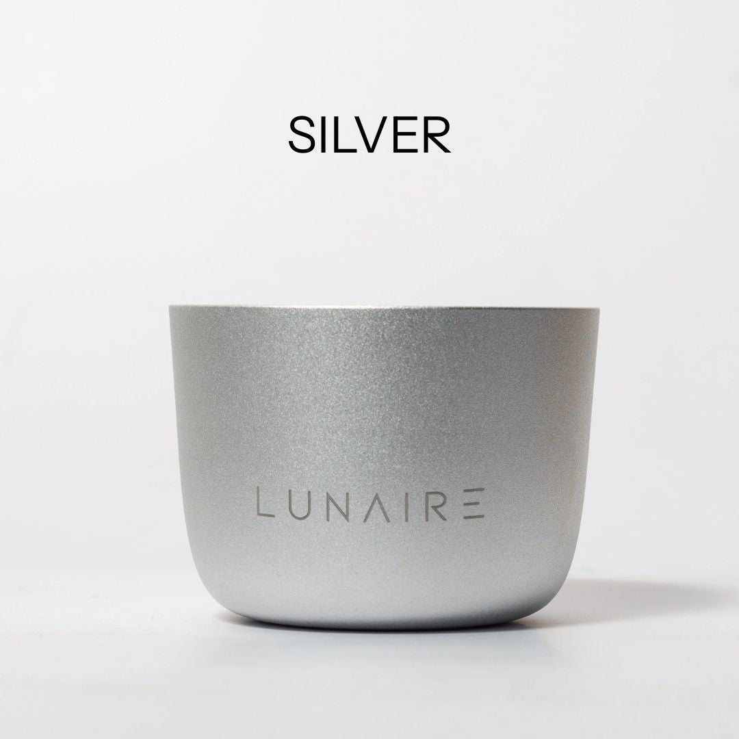 Silver aluminium candle jar with 'LUNAIRE' branding on a white background