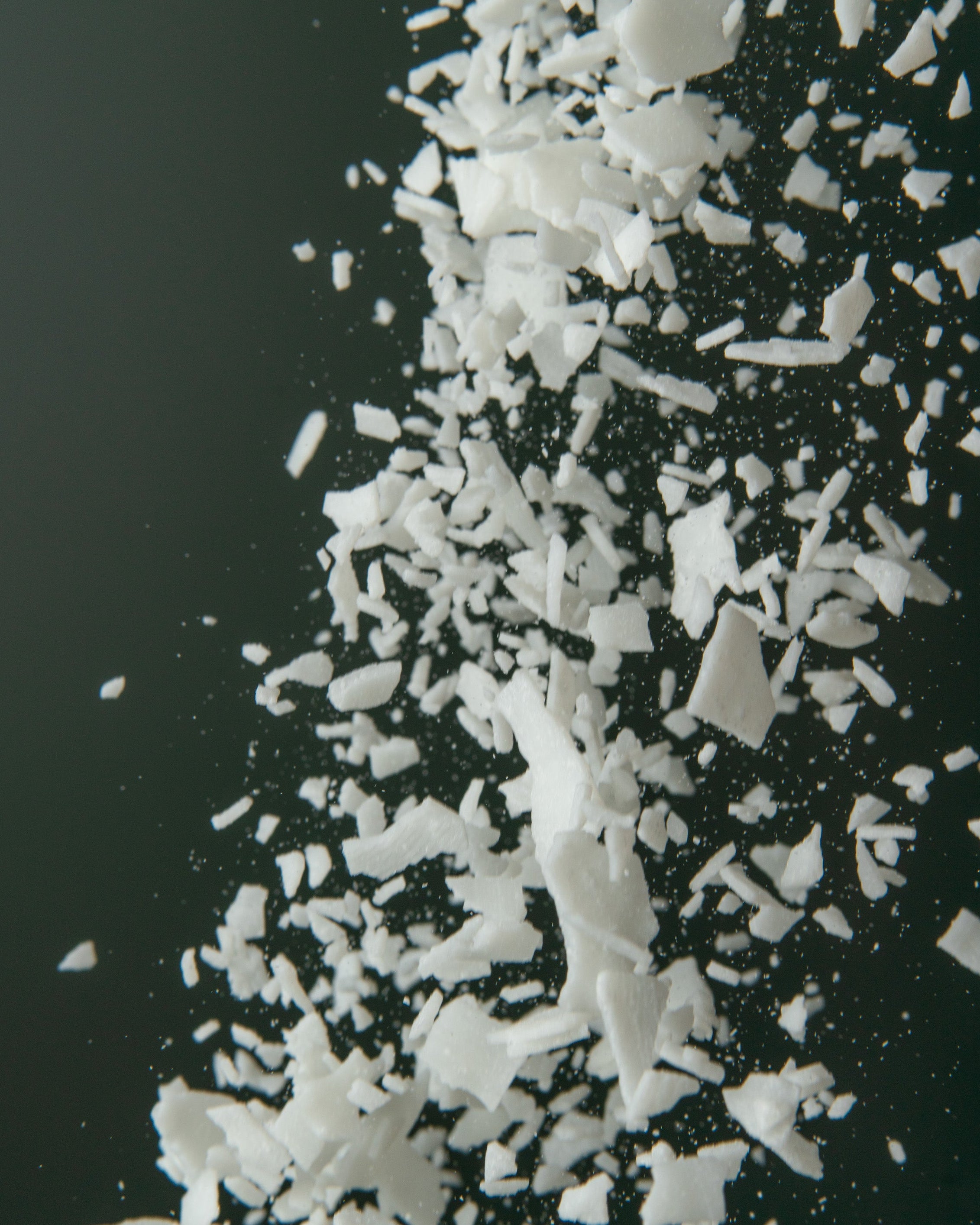 Close-up of natural  soy wax on a black background
