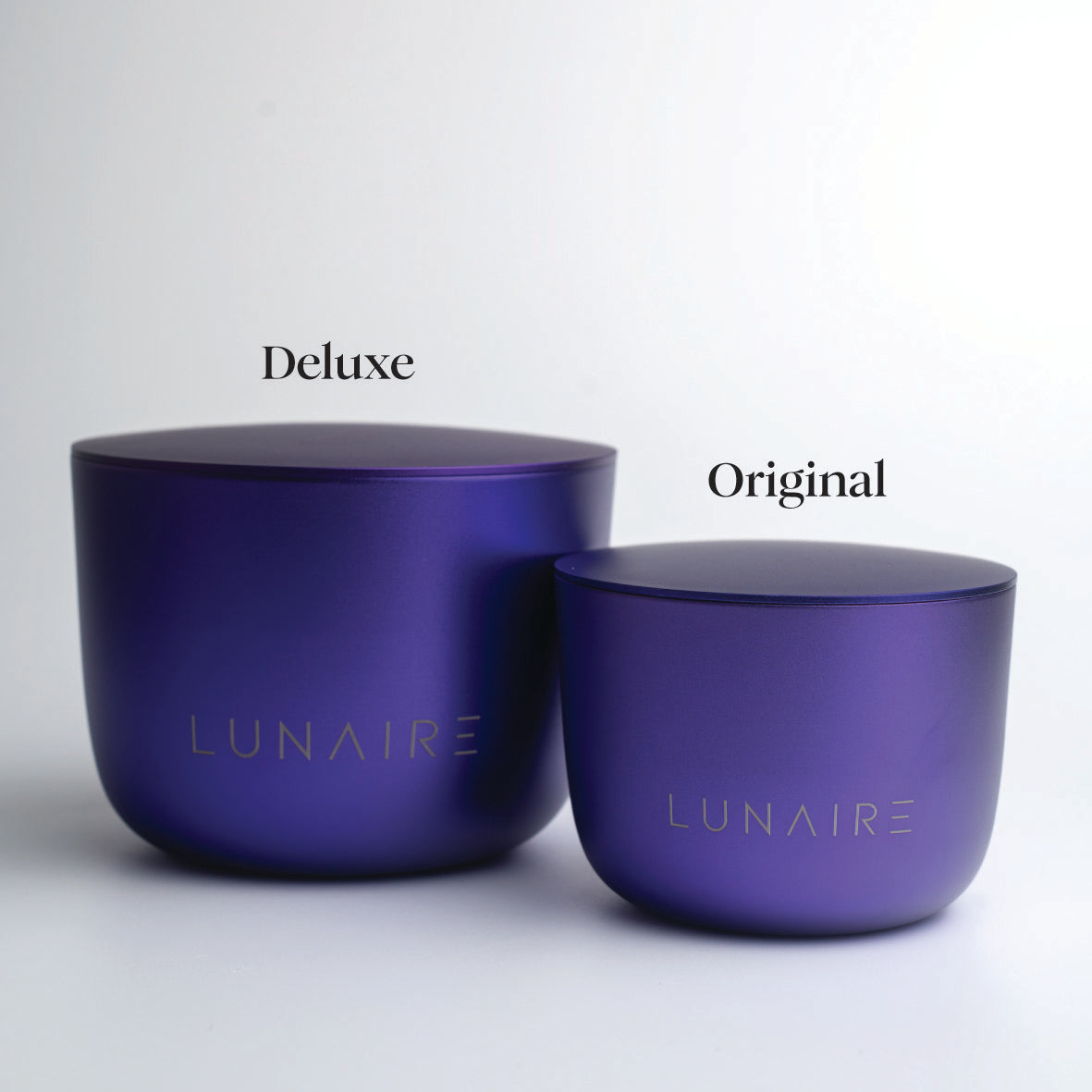 Two purple containers labeled 'Deluxe' and 'Original' by LUNAIRE on a light gray background.