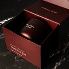 Burgundy-colored jar with 'Forever Jar' branding inside an open red box on a dark marble surface. Personalise Gift. 
