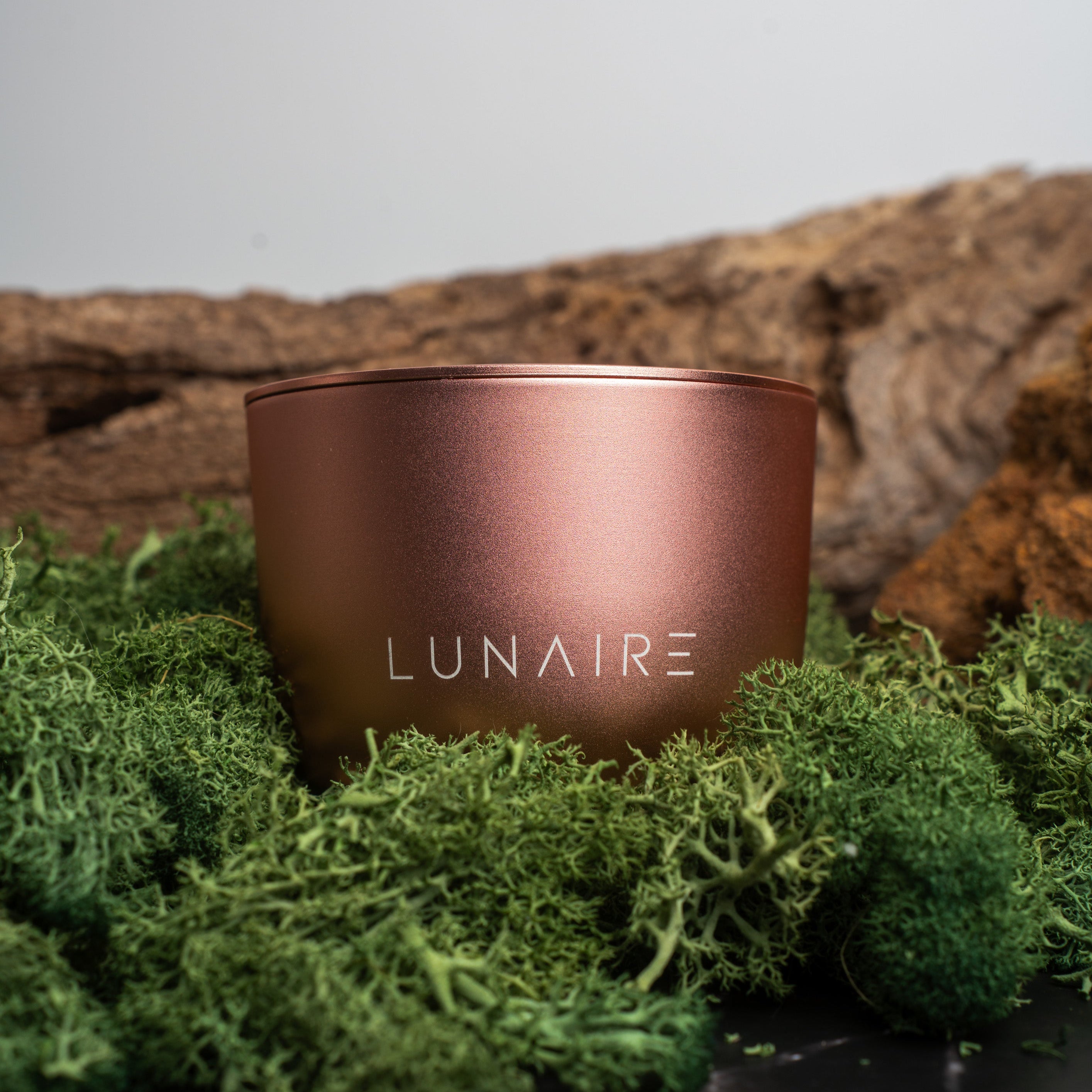 Rose Gold Candle Jar on moss 