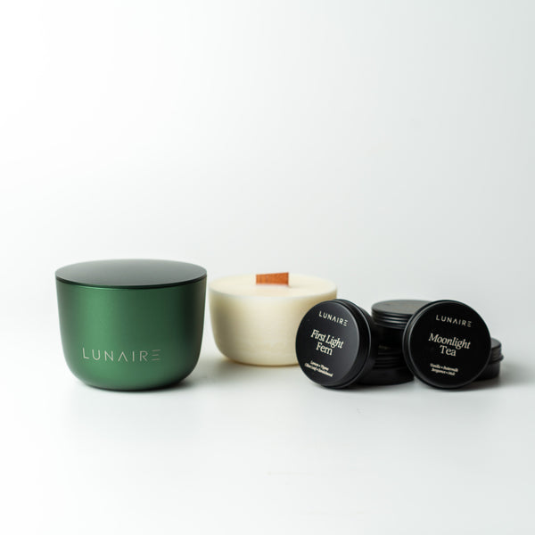 Collection of LUNAIRE candles on a white background