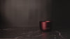 Burgundy Forever Jar Candle being Refilled on a luxury marble bench top 